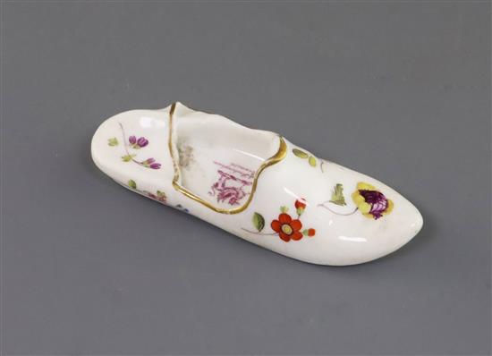 A Rockingham porcelain model of a slipper, c.1830-42, L. 10cm